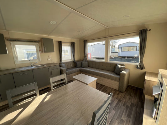 Mobil-home Opal – espace de vie avec canapé