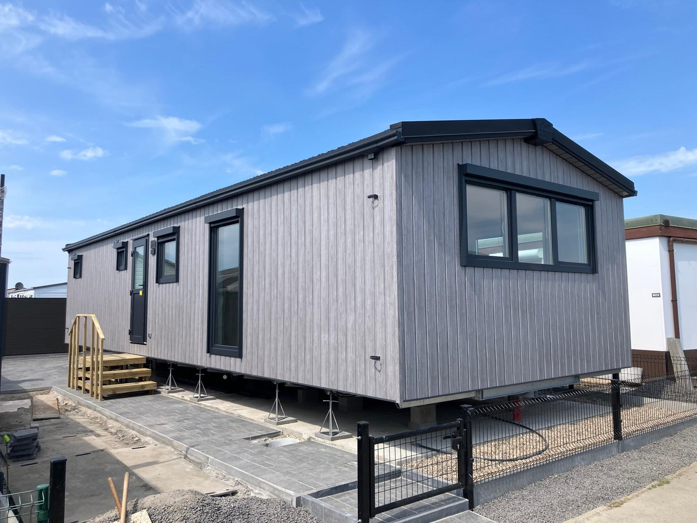 Een op maat gemaakte chalet geplaatst op perceel